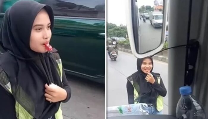 Viral! Jukir Wanita Berhijab Ini Bikin Netizen Terpesona