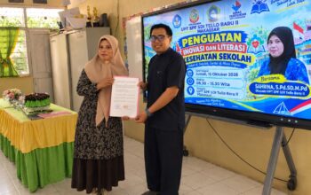 Penandatanganan nota kesepahaman (MoU) antara UPT SPF SD Inpres Tello Baru 2 dan Puskesmas Batua terkait penguatan literasi kesehatan dan pencegahan ISPA di sekolah, Jumat (16/10/2026)
